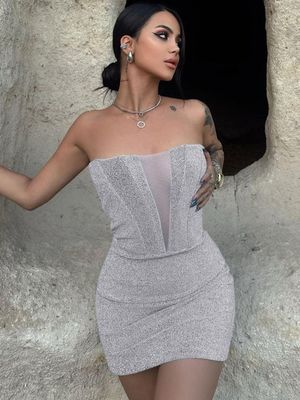 Pacote de Moda Vestido de Quadril Mercerizado Peito Esvaziado Saco Slim Vestido de Clube Hip Sexy